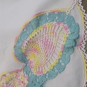 Vintage white pillowcases pink yellow seafoam green doilies embroidered accents